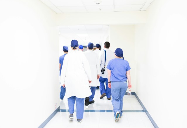 A group of medical staff including doctors and nurses. 